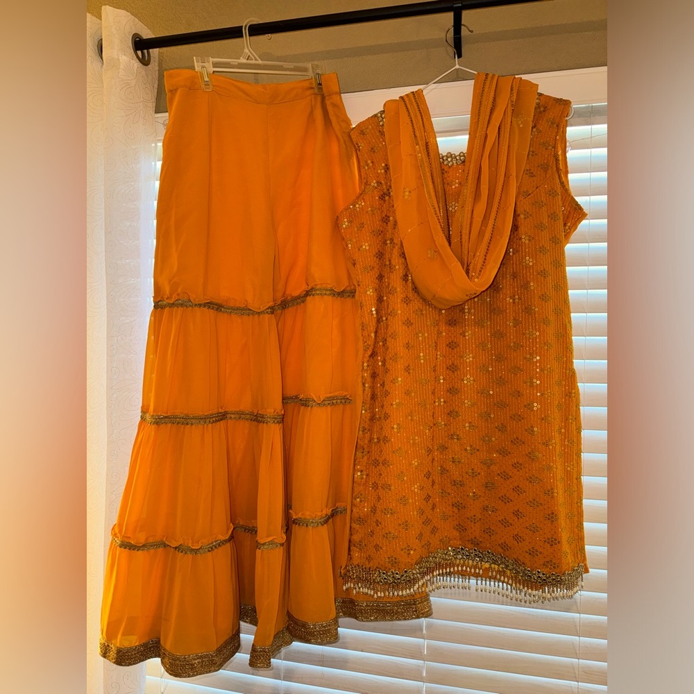 A Pretty Large Readymade Gharara Suit in the color Musturd for Women/Girls